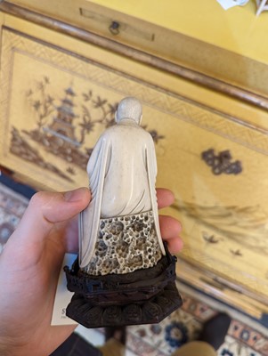 Lot 423 - A set of eighteen carved ivory figures