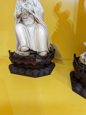 Lot 423 - A set of eighteen carved ivory figures