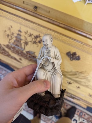 Lot 423 - A set of eighteen carved ivory figures