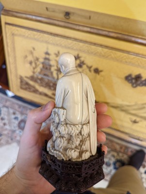 Lot 423 - A set of eighteen carved ivory figures