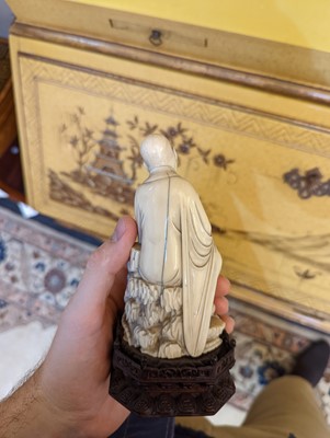 Lot 423 - A set of eighteen carved ivory figures