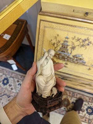 Lot 423 - A set of eighteen carved ivory figures