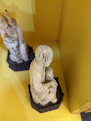 Lot 423 - A set of eighteen carved ivory figures