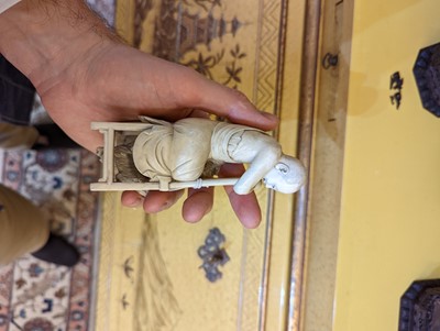 Lot 423 - A set of eighteen carved ivory figures