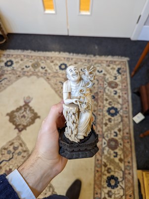 Lot 423 - A set of eighteen carved ivory figures