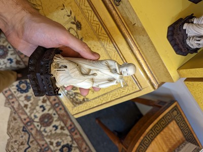 Lot 423 - A set of eighteen carved ivory figures