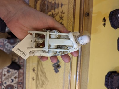 Lot 423 - A set of eighteen carved ivory figures