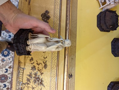 Lot 423 - A set of eighteen carved ivory figures