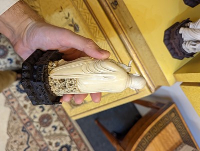 Lot 423 - A set of eighteen carved ivory figures