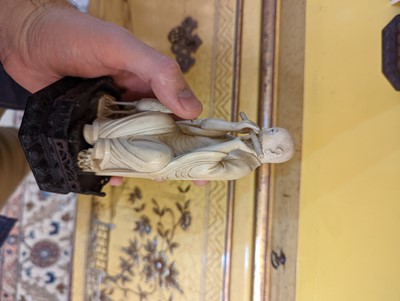 Lot 423 - A set of eighteen carved ivory figures