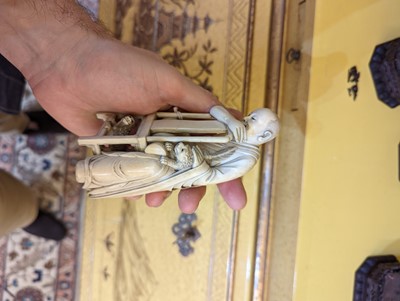 Lot 423 - A set of eighteen carved ivory figures