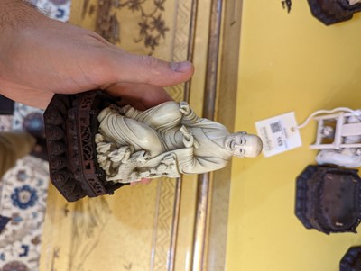 Lot 423 - A set of eighteen carved ivory figures