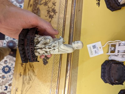 Lot 423 - A set of eighteen carved ivory figures