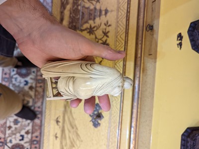 Lot 423 - A set of eighteen carved ivory figures