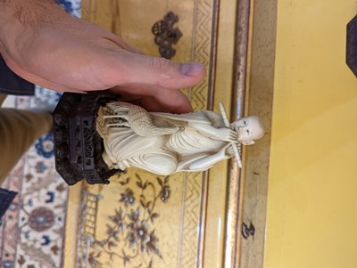 Lot 423 - A set of eighteen carved ivory figures