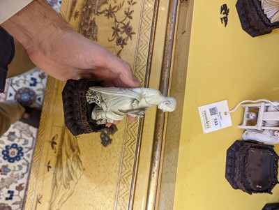 Lot 423 - A set of eighteen carved ivory figures
