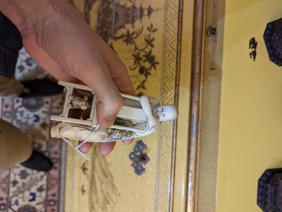 Lot 423 - A set of eighteen carved ivory figures
