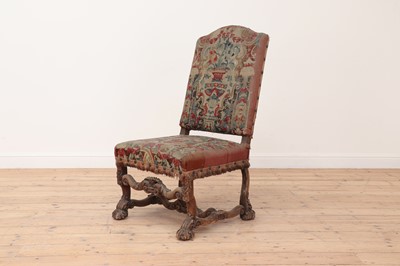 Lot 490 - A carved walnut-framed side chair