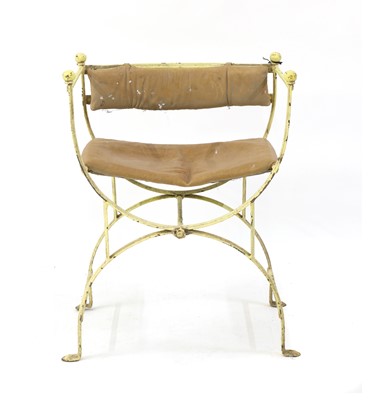 Lot 327 - A Continental iron painted 'X' frame armchair