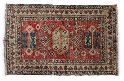 Lot 392 - A Kazak rug