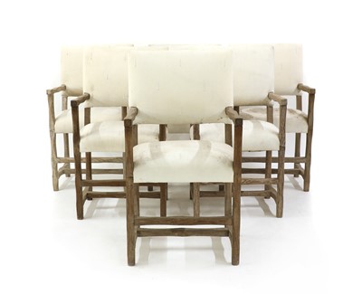 Lot 184 - A set of six limed oak armchairs
