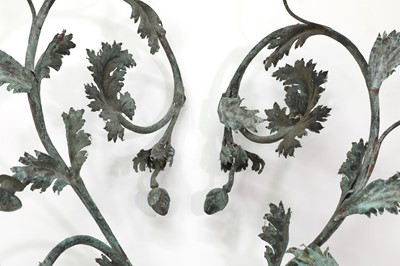 Lot 539 - A pair of patinated copper wall lights