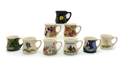 Lot 92 - A collection of Moorcroft pottery mugs
