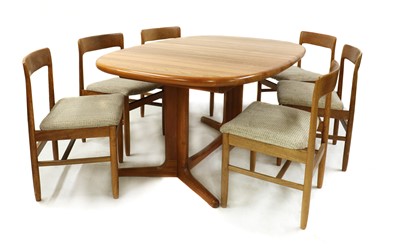 Lot 564 - A Danish teak dining suite