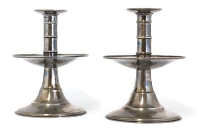 Lot 66 - A pair of silver candlesticks