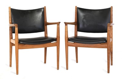 Lot 217 - A pair of 'JH713' oak lounge chairs
