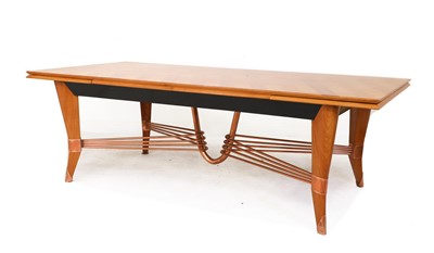 Lot 98 - An Art Deco maple dining table