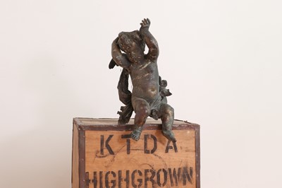 Lot 513 - A gilt-bronze furniture mount in the form of a cherub