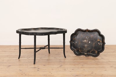 Lot 549 - A Victorian papier mâché lacquer tea tray on stand