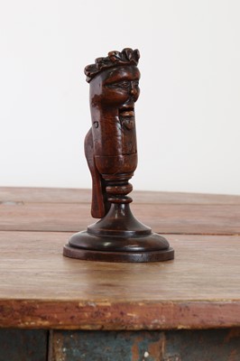 Lot 470 - A fruitwood treen figural nutcracker