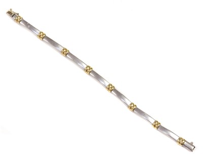 Lot 460 - A two colour Continental hollow bar link bracelet