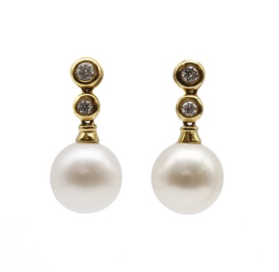 Lot 248 - A pair of cultured South Sea pearl and diamond drop earrings