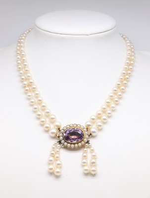 Lot 244 - A two row graduated cultured pearl necklace