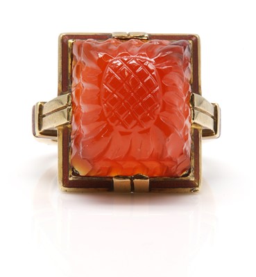 Lot 195 - An American Art Deco cornelian and enamel ring, c.1935-1940