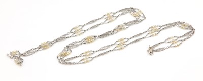 Lot 153 - An Art Deco seed pearl long chain