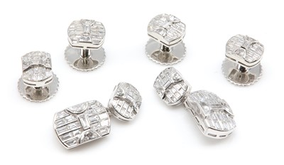 Lot 427 - A diamond set cufflink and dress stud set