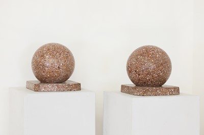 Lot 30 - A pair of polished terrazzo orbs