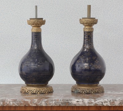 Lot 42 - A pair of Napoleon III Chinese powder-blue porcelain table lamps
