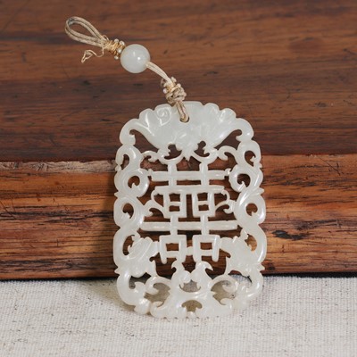 Lot 70 - A Chinese jade pendant