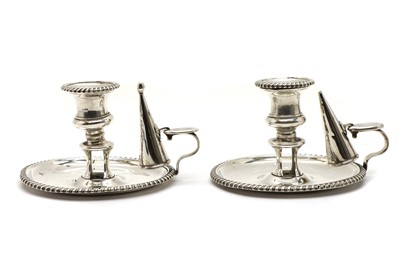 Lot 15 - A pair of George III silver chambersticks