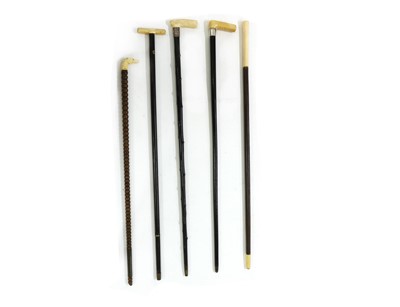 Lot 256 - A group of five ivory handled walking sticks