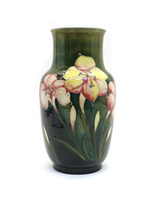 Lot 192 - A Walter Moorcroft pottery ‘African Lily’ pattern vase