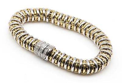 Lot 454 - A two coloured gold diamond set bracelet