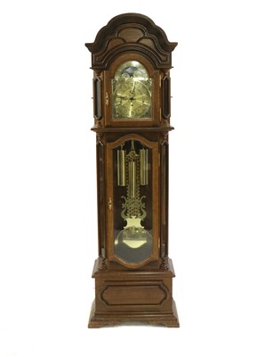Lot 434 - An oak longcase clock