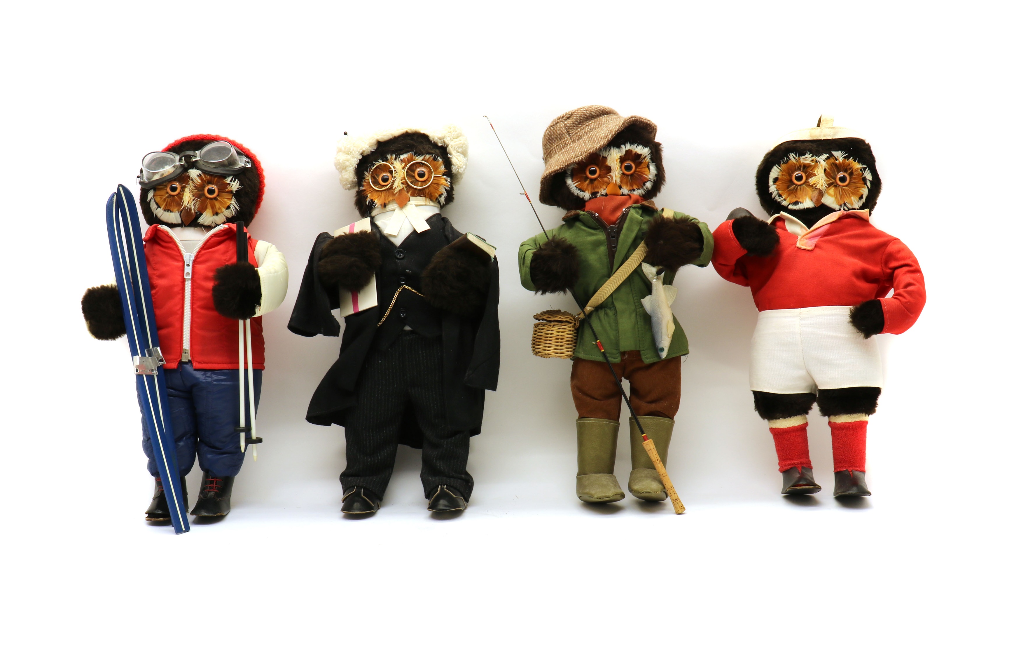 Lot 286 - A collection of four London Owl Company owls