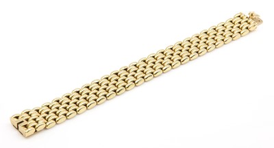 Lot 400 - An 18ct gold seven row panther style bracelet, c.1960